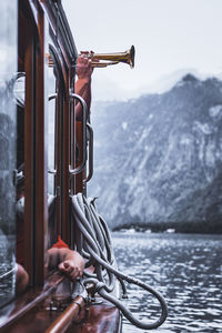 Cropped boat sailing in sea