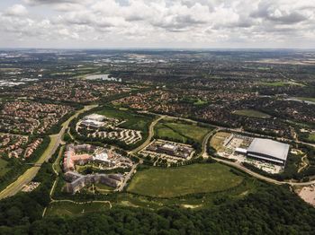 Aerial view of city buildings against sky