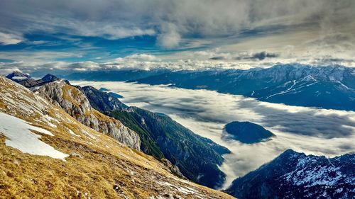 Scenic view of snowcapped mountains against sky