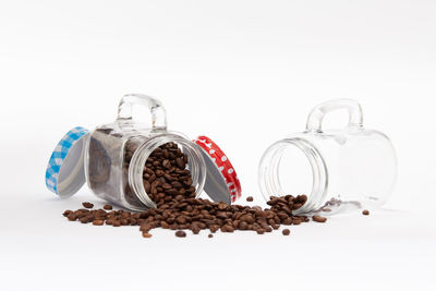 Close-up of coffee beans against white background