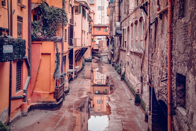 High angle view of alley amidst buildings in city