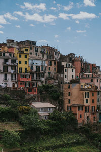 High angle view of residential buildings against sky