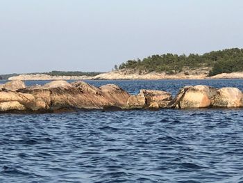 Scenic view of sea against clear sky