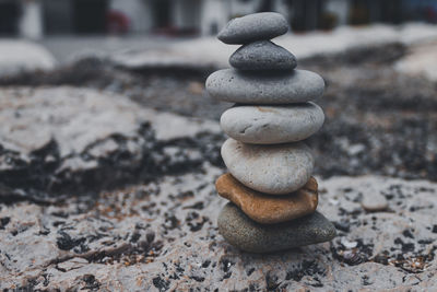 Close-up of stone stack on rock