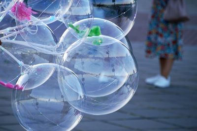 Close-up of transparent balloons at street
