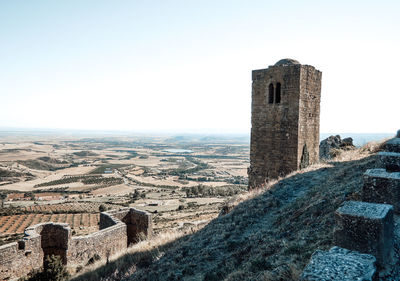Old castle against clear sky