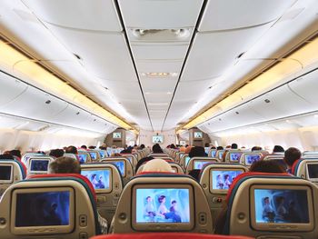 Interior of airplane with passengers