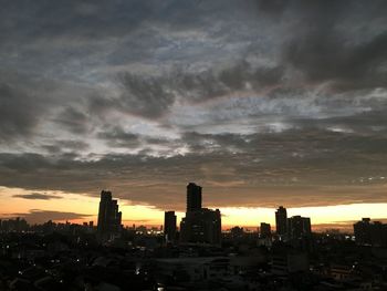 Cityscape against sky during sunset