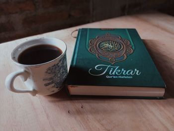 High angle view of coffee cup on table