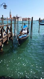 Boats moored in sea
