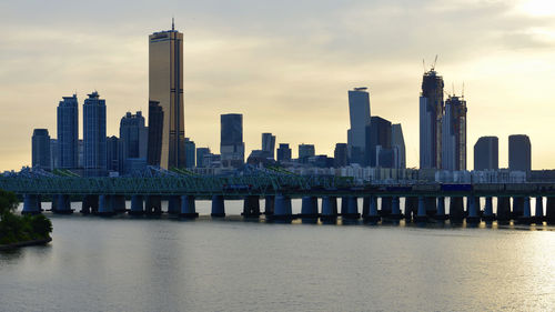 Modern buildings in city against sky