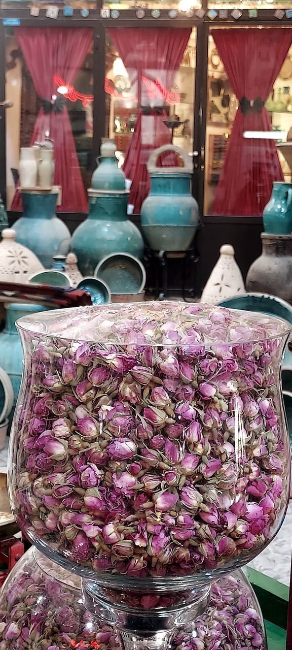market, purple, city, public space, retail, flower, for sale, market stall, large group of objects, pink, business, abundance, no people, food and drink, food, small business, freshness, arrangement, variation, day, container, bazaar, outdoors, business finance and industry