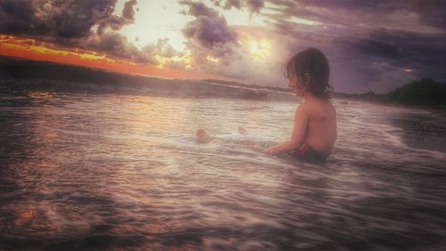 Scenic view of sea at sunset