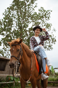 Woman riding horse