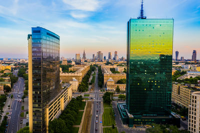 Beautiful panoramic aerial view to the center of modern warsaw city with silhouettes of skyscrapers