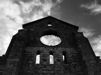 Low angle view of old building against sky