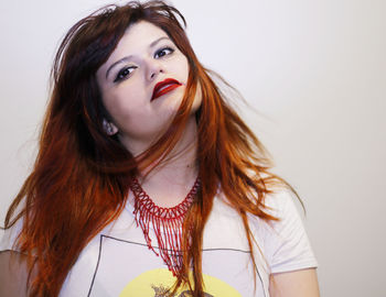 Young woman against white background