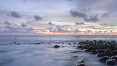 Scenic view of sea against sky during sunset