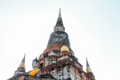 Low angle view of temple building against clear sky