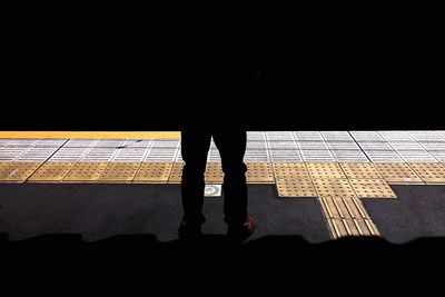 People standing in the dark