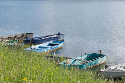 High angle view of boats moored in lake