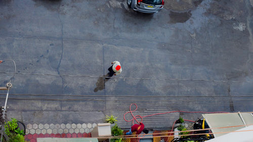 High angle view of people working on plant