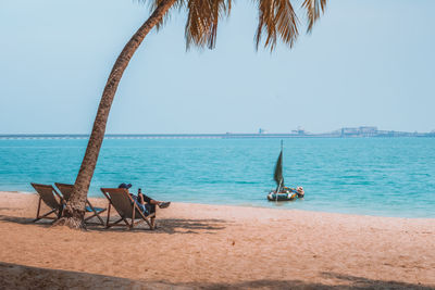 Scenic view of beach against clear sky