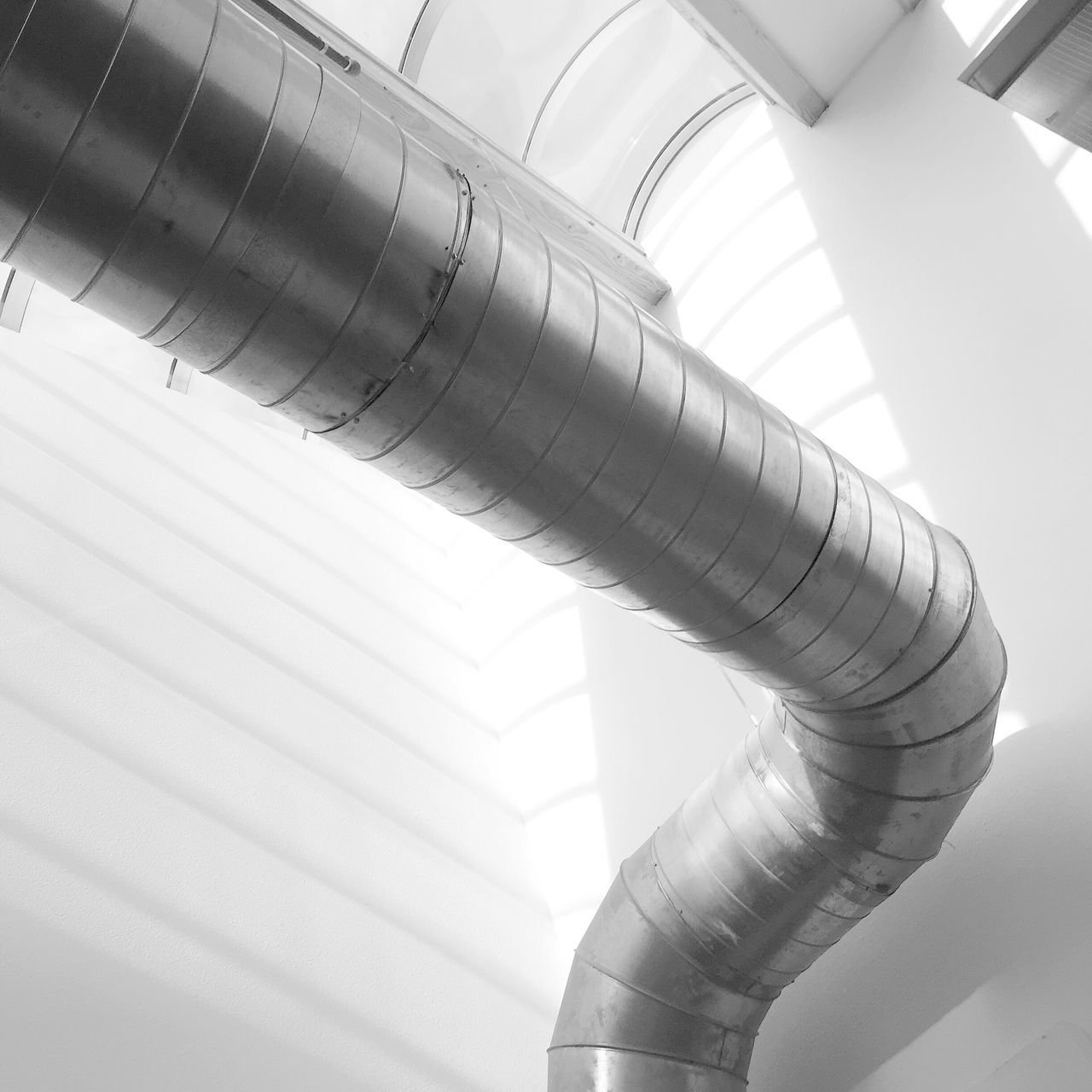 pipe - tube, pipeline, low angle view, industry, architecture, no people, water pipe, close-up, indoors, air conditioner, day