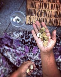 High angle view of hands working