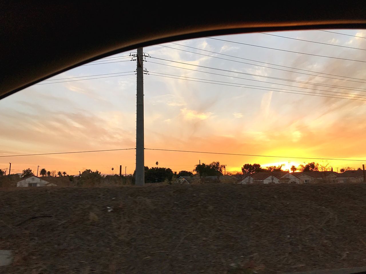 SCENIC VIEW OF SILHOUETTE LANDSCAPE AGAINST SUNSET SKY