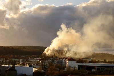 Skyscraper under fire, firefighers at work