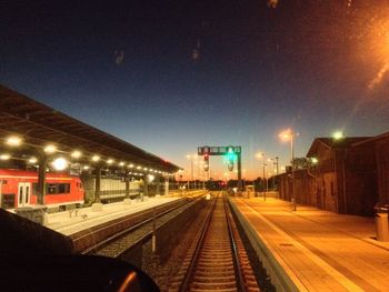 Railroad tracks on railroad station platform