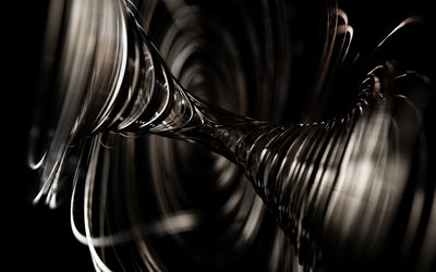 Close-up of metal object against black background