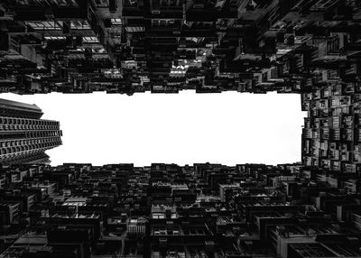 Low angle view of buildings in city against sky