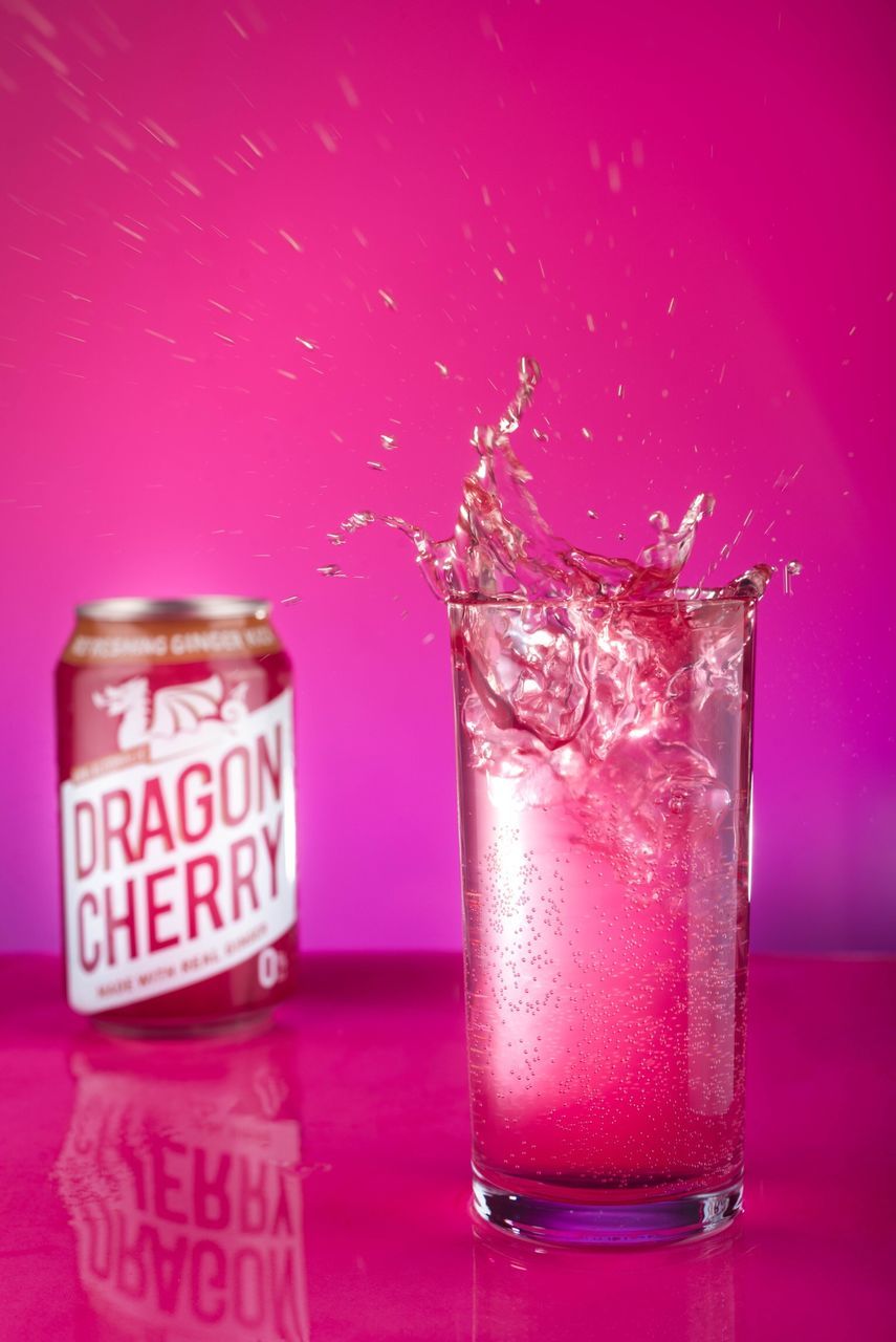 food and drink, indoors, pink color, colored background, close-up, studio shot, drink, refreshment, table, glass, no people, text, freshness, still life, glass - material, household equipment, drinking glass, container, food, purple