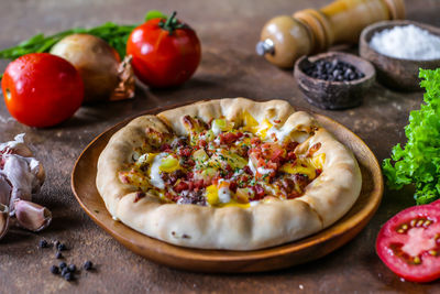 High angle view of pizza on table