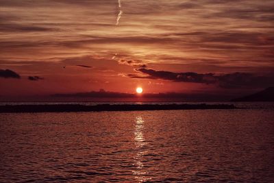 Scenic view of sea at sunset