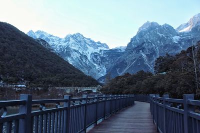 Scenic view of mountains against sky during winter