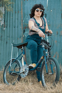 Trendy vintage look girl riding bicycle