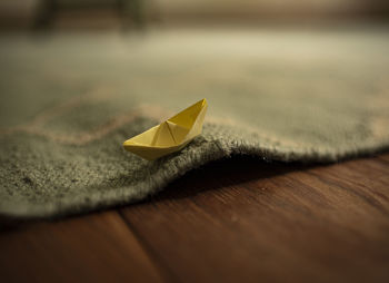 Close-up of origami on carpet