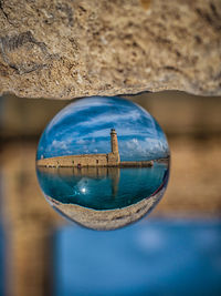 Reflection of historic building on crystal ball