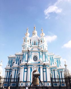 View of building against cloudy sky