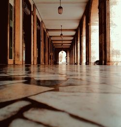 Rear view of woman in corridor