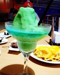 Close-up of ice cream served on table