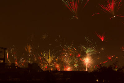 Firework display at night