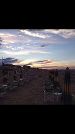 Scenic view of beach against sky during sunset