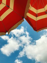 Low angle view of umbrella against sky