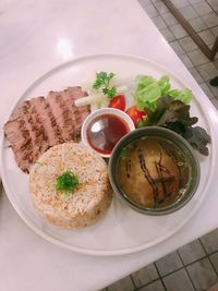 High angle view of food served on table