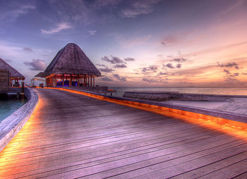 Scenic view of beach against sky during sunset