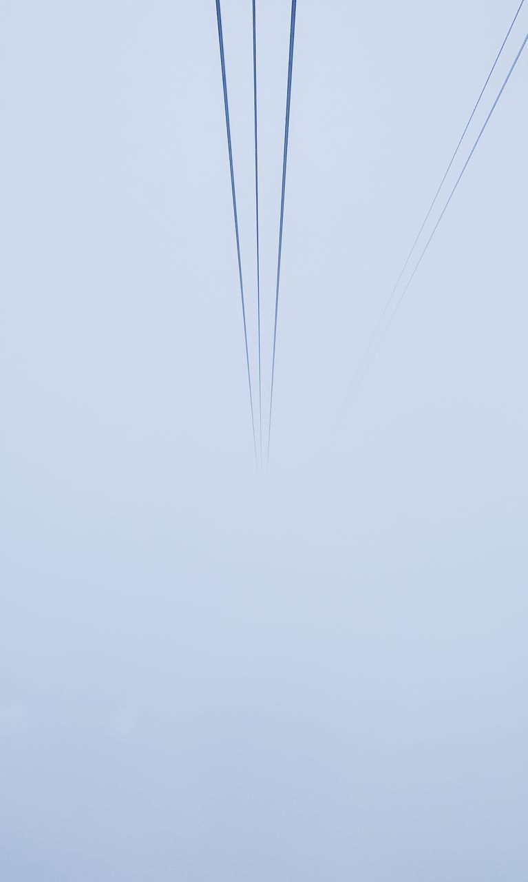 CLOSE-UP OF VAPOR TRAIL OVER WHITE BACKGROUND